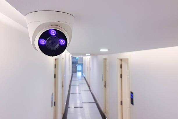 istock Surveillance Video Camera  wireless CCTV security system.Modern technology and equipment.Surveillance camera on the ceiling for security inside the building. 2217872471