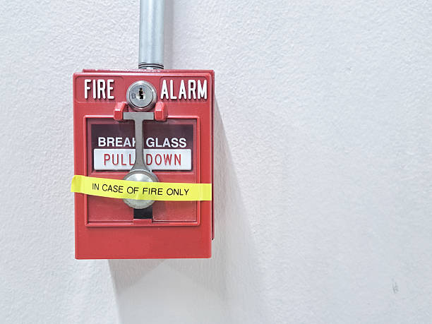 istock Fire alarm on the wall. Safety building system.Fire Alarm Signal on Brick wall. Fire security 2217872473