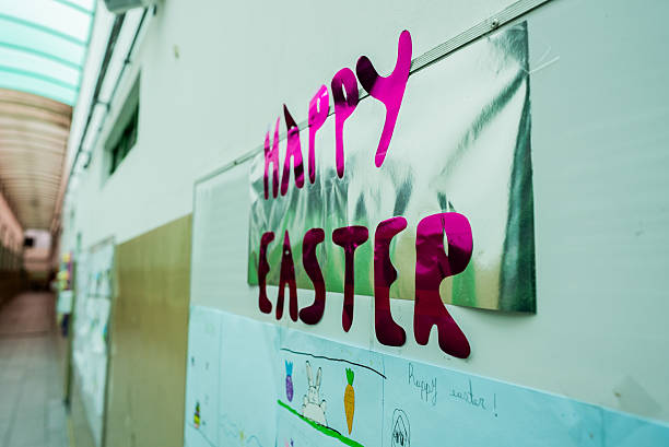istock Decorated wall at school wishing Easter greetings - English Language 2217874516
