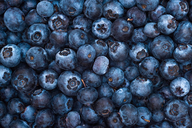 istock Background of fresh blueberries, close-up. 2217878811