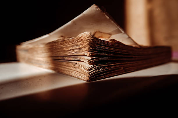 istock Close-Up Texture of Vintage Book Pages in Shadow 2217882047
