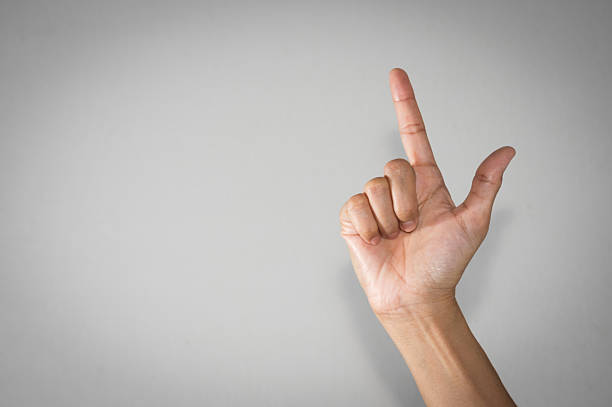 Woman hand showing index finger and thumb or getting an idea sign.