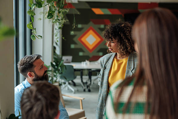 istock Young business team having a discussion in a modern office 2217889202