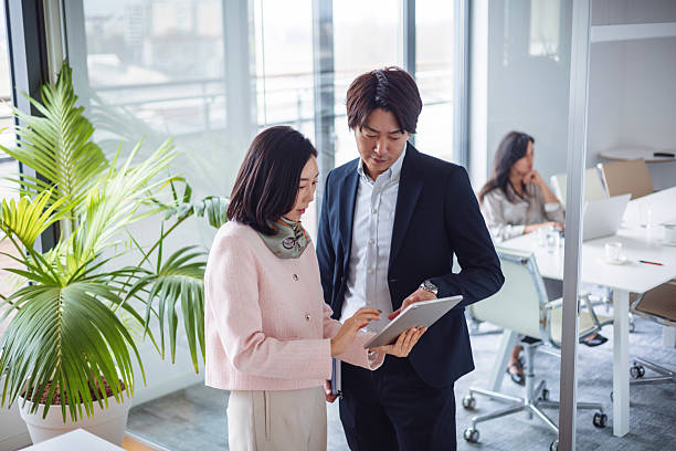 istock Asian Business Team Collaborating in Modern Office 2217890142