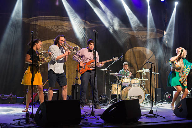 istock Rock band playing at the concert 2217896124