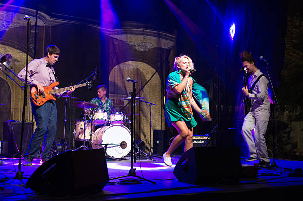 istock Rock band playing at the concert 2217896207