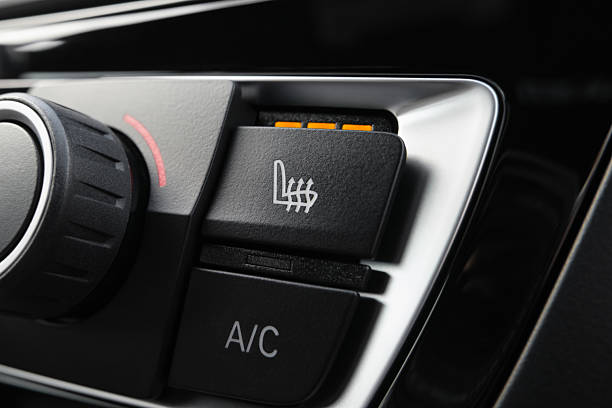 Closeup of heated seat button in a modern car.