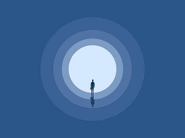 istock Businessman in the tunnel finds the light 2217903791
