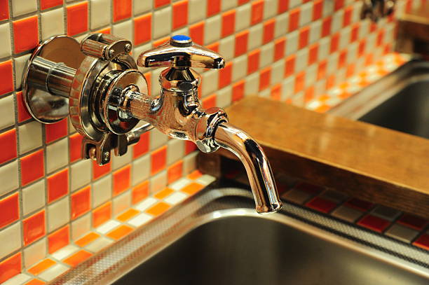 washing in Rustic brass sink, morning skincare routine in Moroccan-style interior, Self-care and mindfulness, basic hygiene and cultural touch in Morocco
