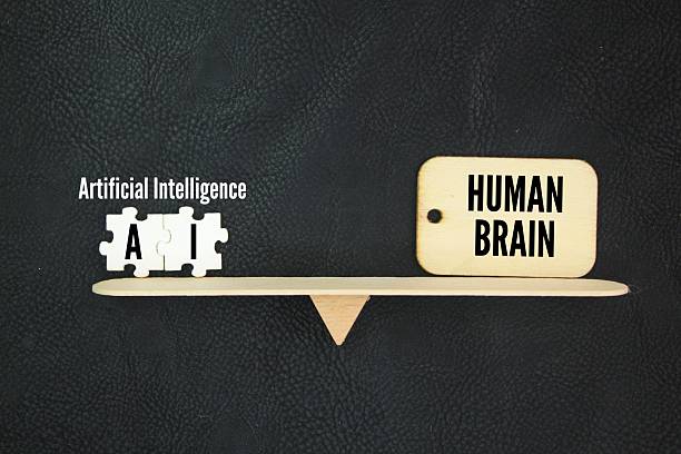 istock the balance between the words human brain vs. artificial intelligence. The balance between humans and AI. Create art generate content impact. 2217913179