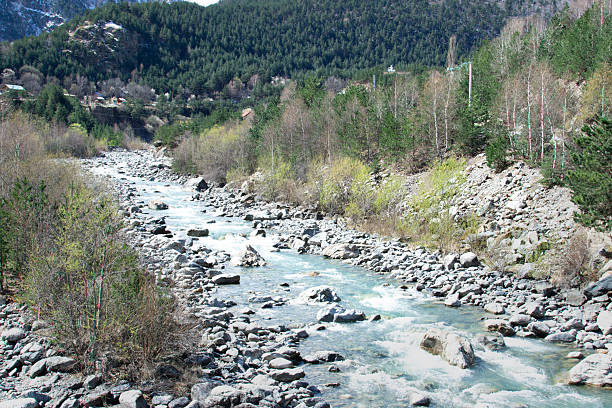 istock River rapids flowing near the mountain. North Ossetia 2217916043