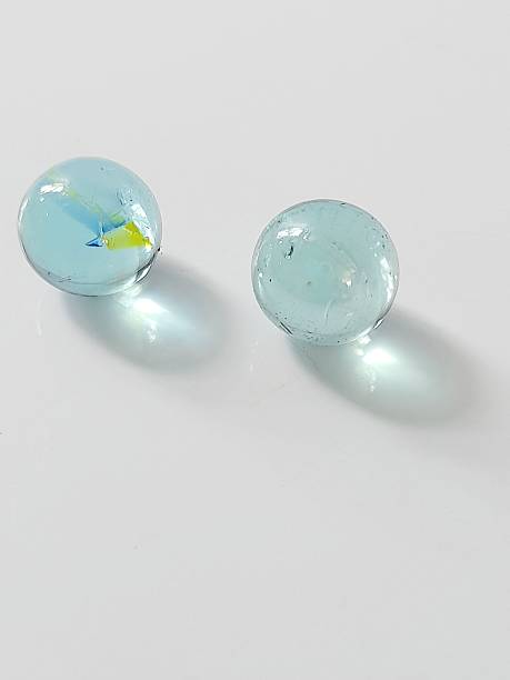 istock Clear glass ball on white background. 2217916167