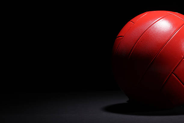 New Volleyball Ball Studio Shot And Isolated On Black. High quality photo