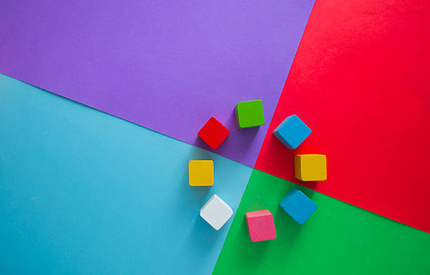 istock Colorful cubes on a vibrant multicolored background for a creative project 2217920524