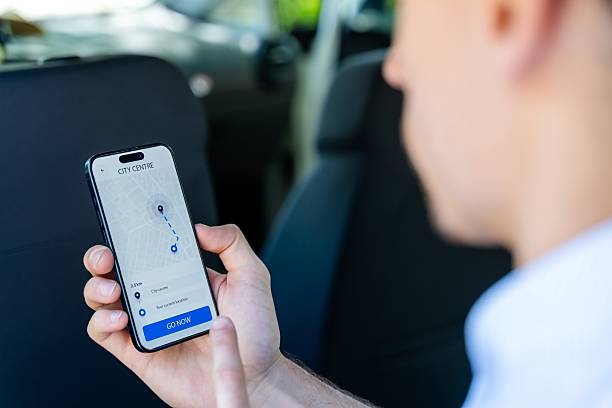 istock Businessman using gps app on smartphone 2217924042