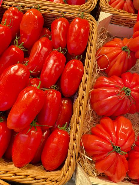 A selection of different colored organic heirloom tomatoes from the local farmer's market