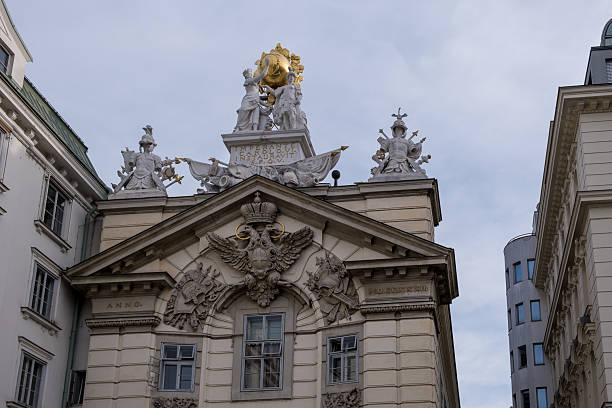 Vienna, Austria – Firefighters Memorial at Am Hof square, bronze sculpture honoring 19th-century firefighters with eternal flame.