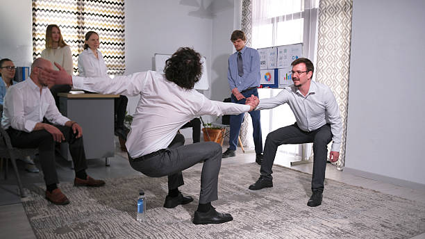 istock A fun game to help employees get to know each other better, establish trusting relationships, and feel like part of a team. Team building 2217935307