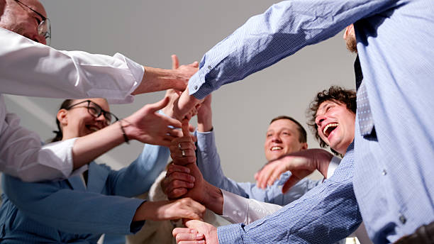 istock A team of happy students is having fun playing office games. A leadership development game, an opportunity to awaken healthy competition 2217940208