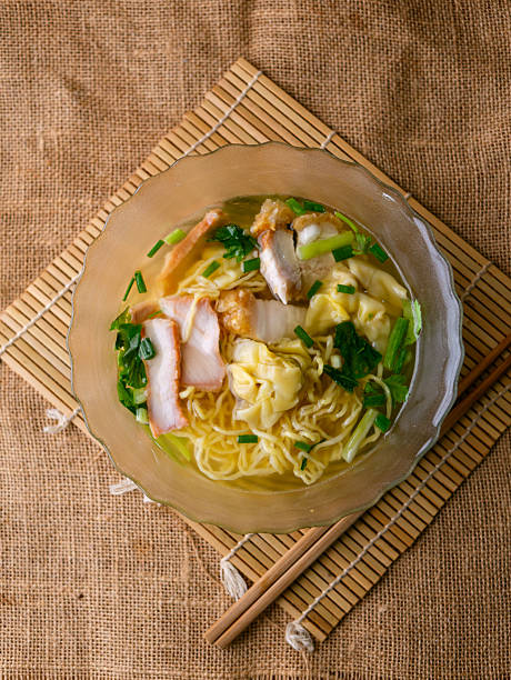 istock egg noodles with wonton roasted pork and crispy pork. 2217941980