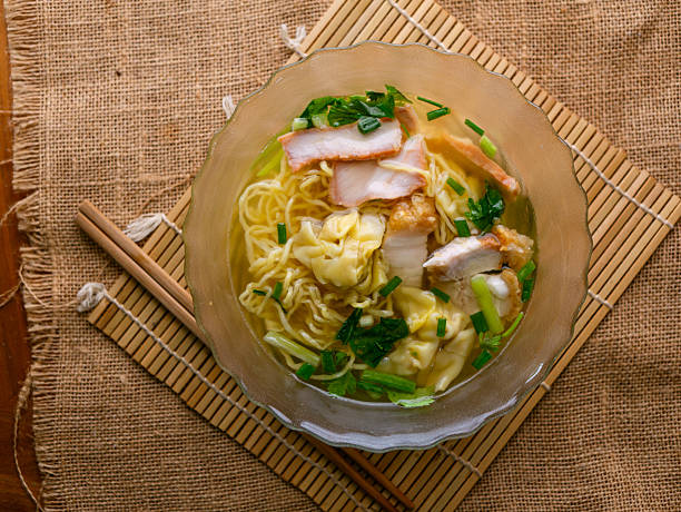 istock egg noodles with wonton roasted pork and crispy pork. 2217941981