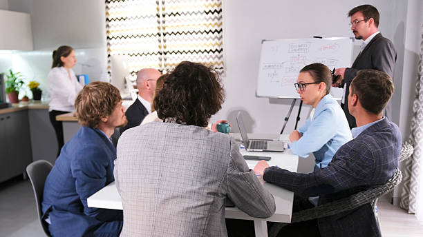 istock The business group discusses important cooperation issues. The concept of finding a strategy for group interaction in a crisis 2217942068