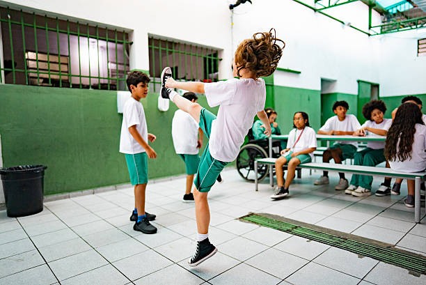 istock School children having fun on the courtyard at school 2217943967