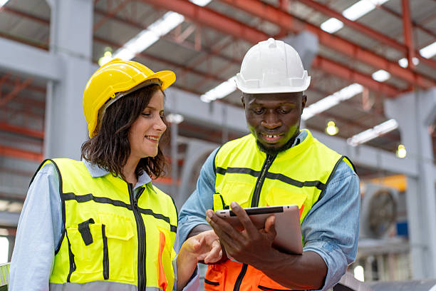 istock female engineer supervisor advice technician foreman to inspect spare part equipment 2217952450