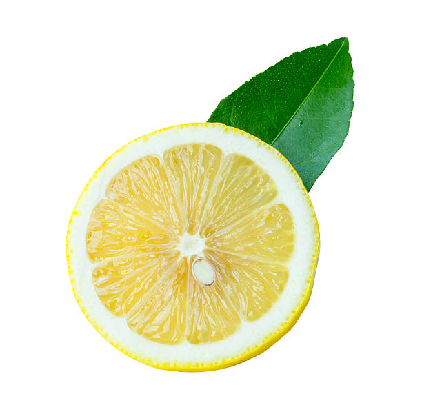 Front view of ripe yellow lemon fruit in one half with green leaf isolated on white background with clipping path