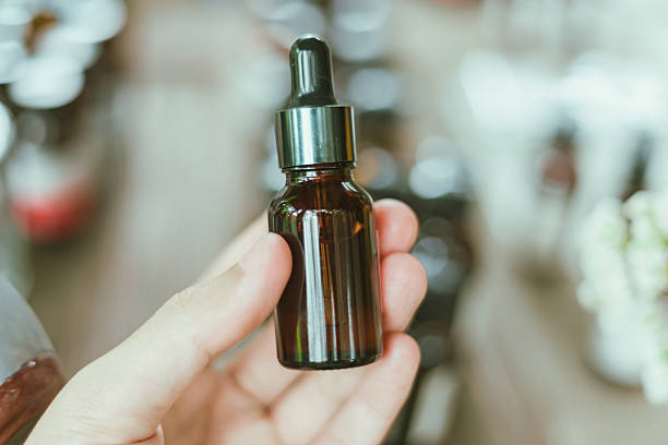istock Shot of mature perfumer adding extra essential oil 2217956071