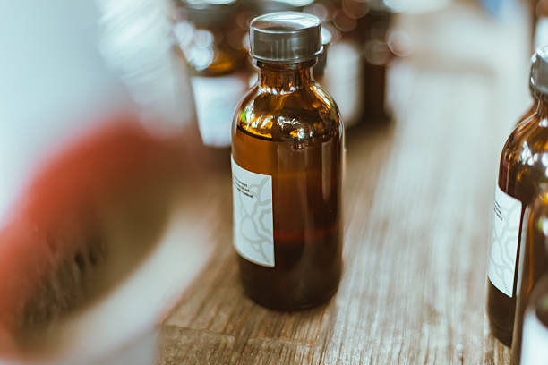 istock Shot of mature perfumer adding extra essential oil 2217956267