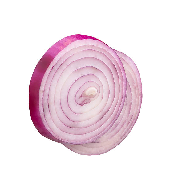 istock Fresh peeled red or purple Spanish onion in two slices in circle shape in stack isolated on white background with clipping path 2217956330