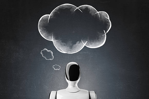istock Futuristic white humanoid robot with glossy black faceplate imagining a cloud on a dark concrete background representing artificial intelligence concept. 3D Rendering 2217957620