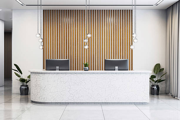 istock Modern luxury office reception area with elegant marble desk, wooden panel wall and pendant lights in a corporate interior design setting. 3D Rendering 2217957829