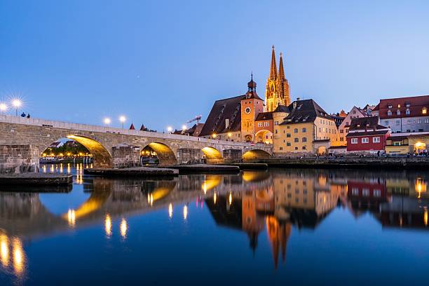 istock Stone Bridge and Cathedral in Regensburg at Dusk 2217962924