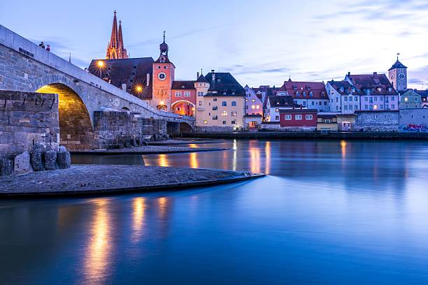 istock Regensburg's Stone Bridge at Dusk 2217962945