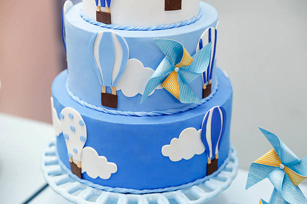 istock Blue birthday cake with playful kids decoration 2217965765