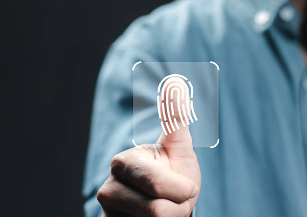 istock Fingerprint scan provides security access with biometrics identification. Thumbs up with virtual fingerprint to scan biometric identity, access password for technology security system prevent hacker. 2217967880