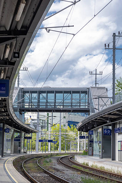 istock Modern Train Station with Overhead Pedestrian Bridge 2217972208