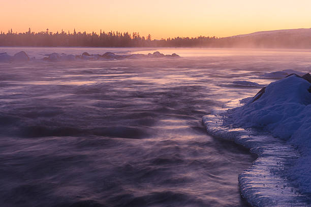 istock Serene river ice at sunset during winter in Norway with soft light and gentle water flow 2217972255