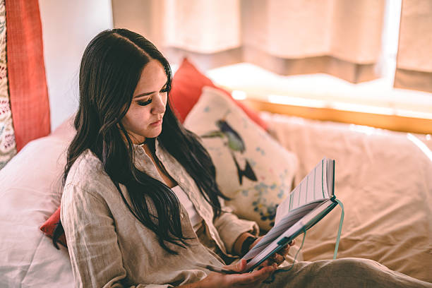 istock Woman relaxing at home 2217976500