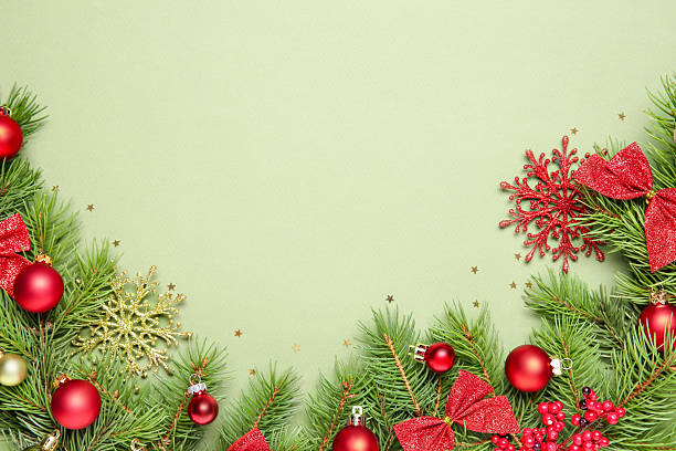 istock Flat lay composition with Christmas decor on green background, space for text 2217980905