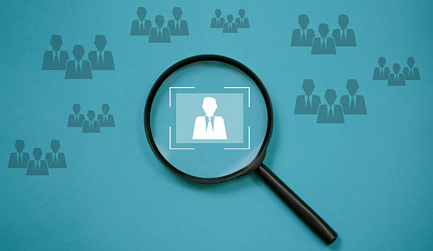 istock Magnifying Glass Focused on Human Resource Icon in Crowd 2217981305