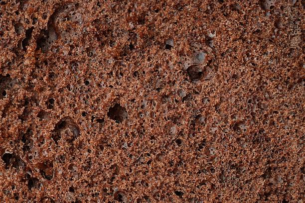 istock Tasty chocolate sponge cake as background, closeup 2217981377