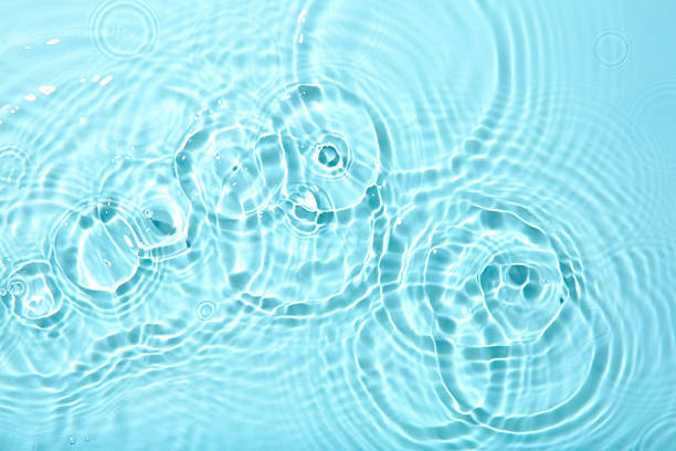 istock Rippled surface of clear water on light grey background, top view 2217988617
