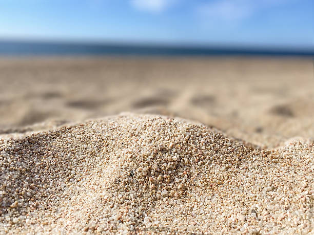 istock Calm Ocean Wave on a Sunny beach 2217990692