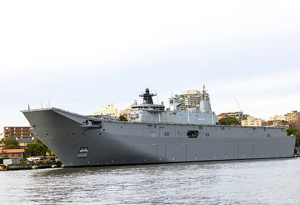 istock Navy ship at the dock, white background with copy space 2217993031