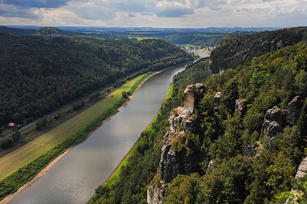 In Saxony, in southeast Germany, the summit of the Elbe Sandstone Mountain overlooks the Elbe River.