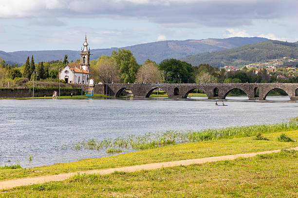 istock Medieval bridge and Church in Ponte de Lima 2217997395