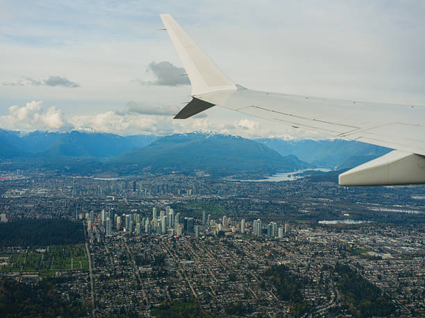 istock Vancouver cityscape and mountains visible from the airplane window 2218001852